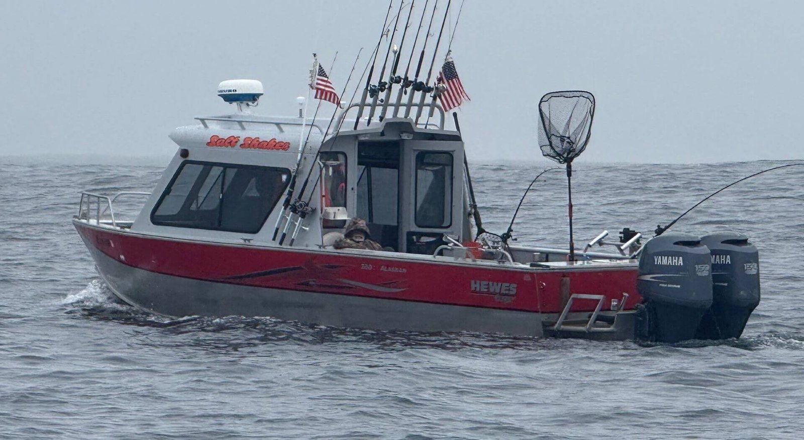 Salt Shaker fishing charter boat trolling offshore on the Pacific Ocean near Newport Oregon.